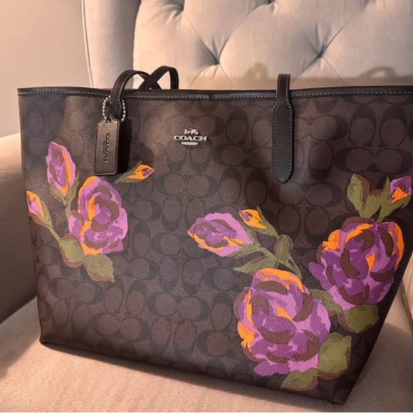 Coach Handbags - Unique Coach Brown Signature Tote with Purple and Orange Floral Print